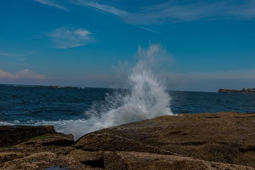 The wave hitting on the rocks