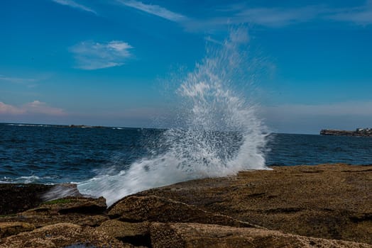 The wave hitting on the rocks