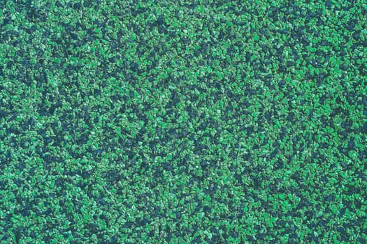 Closed up shot of Texture on the floor Navy blue and green colors.