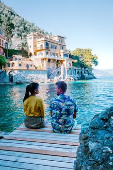 couple on vacation ligurian coast Italy,Portofino famous village bay, Italy Europe colorful village Ligurian coast