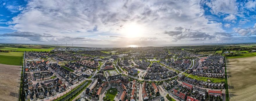 Top view of house Village from Drone capture in the air house is brown roof top Urk netherlands Flevoland. High quality photo with drone