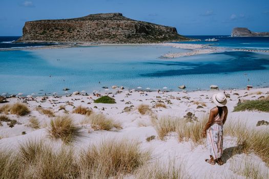 Balos Beach Crete Greece, Balos beach is on of the most beautiful beaches in Greece at the Greek Island, woman in a swimsuit on the beach