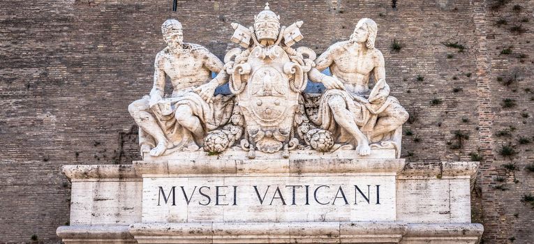 ROME, ITALY - CIRCA SEPTEMBER 2020: the famous Vatican Museum building. Detail of the sign above the main entrance.