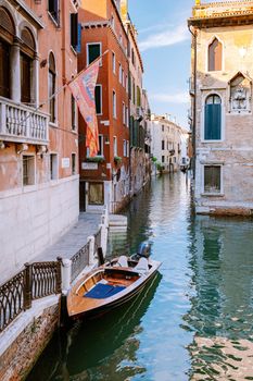 Beautiful venetian street in summer day, Italy. Venice Europe