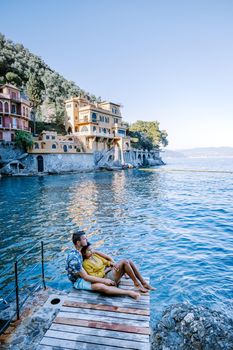 couple on vacation ligurian coast Italy,Portofino famous village bay, Italy Europe colorful village Ligurian coast