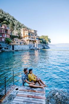couple on vacation ligurian coast Italy,Portofino famous village bay, Italy Europe colorful village Ligurian coast