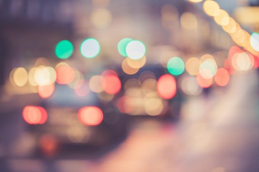 City traffic in the night, blurred with light points
