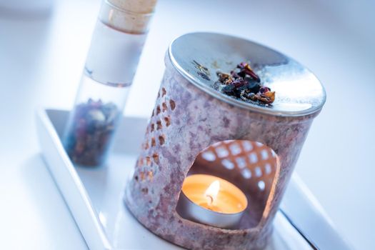 Close up picture of incense, candle