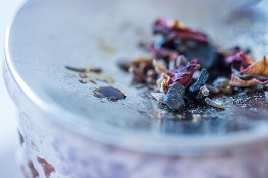 Close up picture of dried incense in a glass bowl