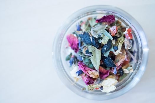 Close up picture of dried incense in a glass bowl