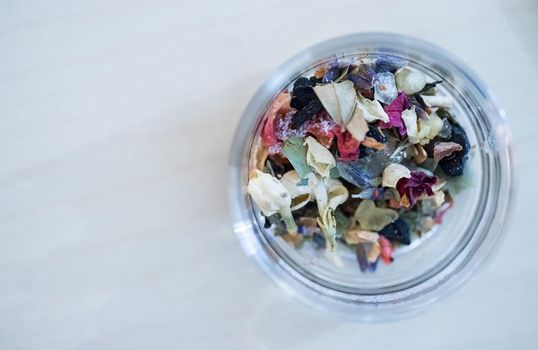 Close up picture of dried incense in a glass bowl