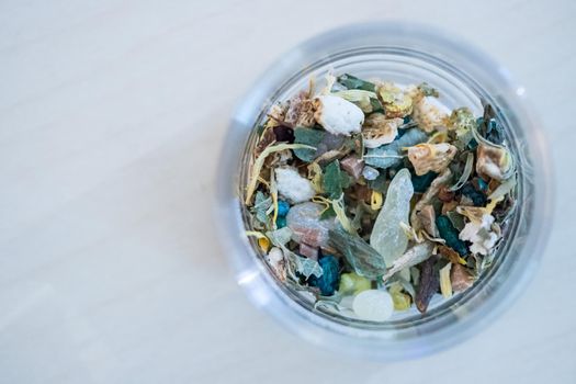 Close up picture of dried incense in a glass bowl