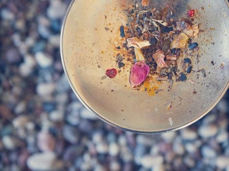 Close up picture of dried incense on a metal bowl