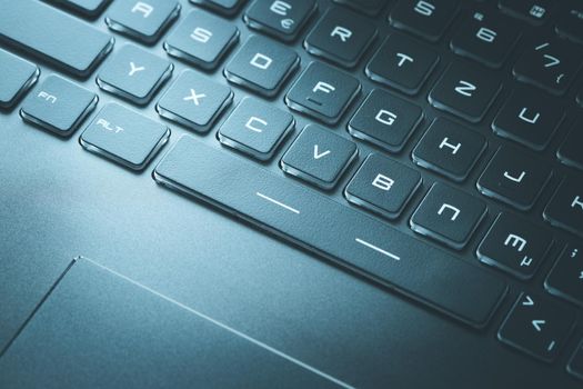 Laptop keyboard and touchpad: closeup picture
