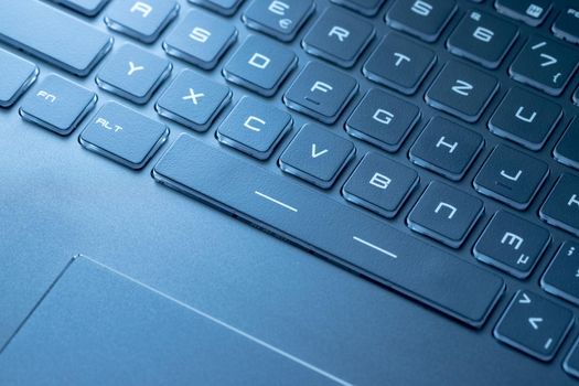 Laptop keyboard and touchpad: closeup picture