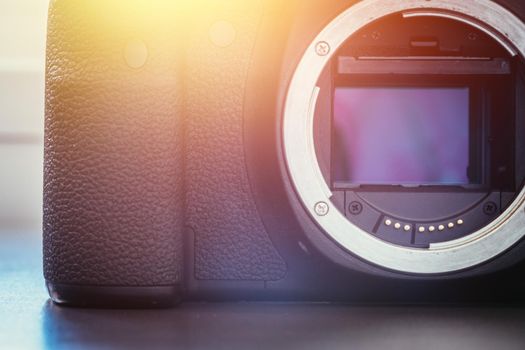 Close up picture of a camera sensor, professional reflex camera. Sunlight.