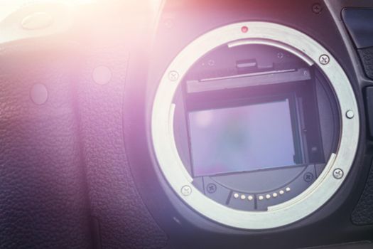 Close up picture of a camera sensor, professional reflex camera. Sunlight.