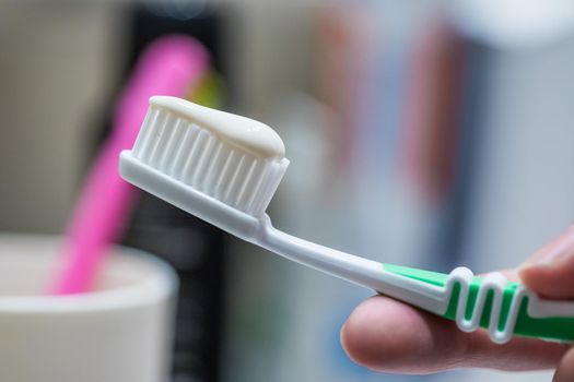 Colorful toothbrush in the bathroom, morning routine