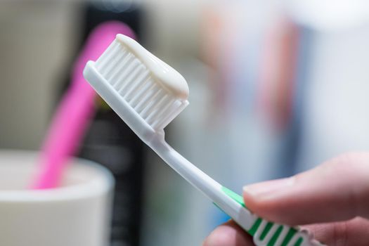 Colorful toothbrush in the bathroom, morning routine