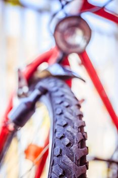 Close up picture of a mountain bike tyre, summer day