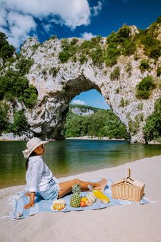 woman on vacation in the Ardeche France Pont d Arc, Ardeche France,view of Narural arch in Vallon Pont D'arc in Ardeche canyon in France Europe
