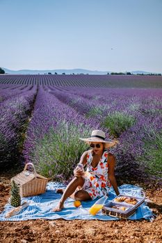 Provence, Lavender field France, Valensole Plateau, colorful field of Lavender Valensole Plateau, Provence, Southern France. Lavender field. Europe. woman on vacation at the provence lavender fields,