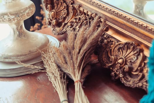 interior decoration, Detail image of the ornate, carved mirror frame in ancient style.