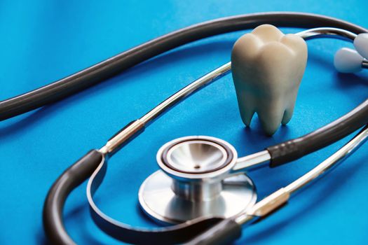 Dental model and dental equipment on blue background, concept image of dental background. dental hygiene background