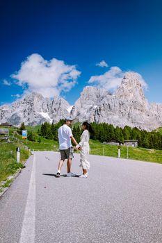 Pale di San Martino from Baita Segantini - Passo Rolle italy,Couple visit the italian Alps, View of Cimon della Pala, the best-know peak of the Pale di San Martino Group in the Dolomites, northern Italy Europe