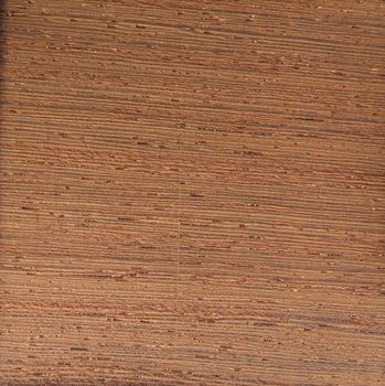 Natural golden wengen crown cut wood texture background. golden wengen crown cut veneer surface for interior and exterior manufacturers use.