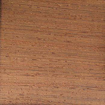 Natural golden wengen crown cut wood texture background. golden wengen crown cut veneer surface for interior and exterior manufacturers use.