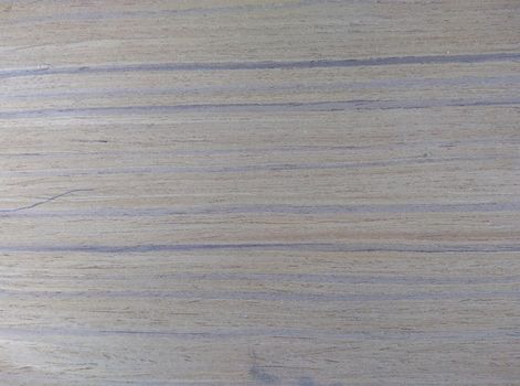 Natural Dark gray burma teak wood veneer close up image. natural textured slices of wood.