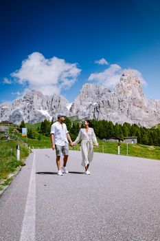 Pale di San Martino from Baita Segantini - Passo Rolle italy,Couple visit the italian Alps, View of Cimon della Pala, the best-know peak of the Pale di San Martino Group in the Dolomites, northern Italy Europe