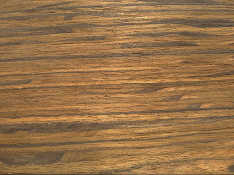 Natural mexican ziricote wood texture background. veneer surface for interior and exterior manufacturers use.