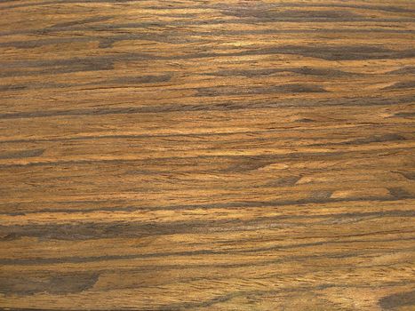 Natural mexican ziricote wood texture background. veneer surface for interior and exterior manufacturers use.