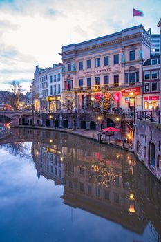 Utrecht, Netherlands Holland Europe January 2021 Almost empty city during the second wave in the Netherlands of the coronavirus pandemic covid 19, Traditional houses on traditional houses on the Oudegracht Old Canal in the center of 