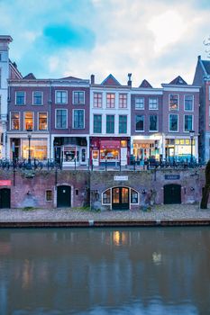 Utrecht, Netherlands Holland Europe January 2021 Almost empty city during the second wave in the Netherlands of the coronavirus pandemic covid 19, Traditional houses on traditional houses on the Oudegracht Old Canal in the center of 