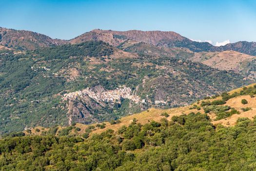 View of Francavilla di Sicilia and surrounding valley and mountains in a sunny afternoon