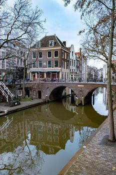 Utrecht, Netherlands Holland Europe January 2021 Almost empty city during the second wave in the Netherlands of the coronavirus pandemic covid 19, Traditional houses on traditional houses on the Oudegracht Old Canal in the center of 