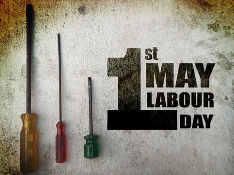 1st MAY Labour Day word on screwdrivers background grunge tone