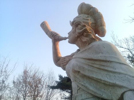 CHUNCHEON, SOUTH KOREA- February, 2018: White marble statue of Historical person with lovely stature settled in a public park