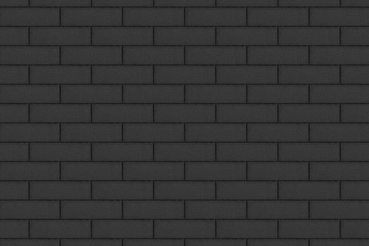 The brick wall is dark gray in color.Texture or background