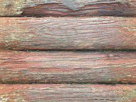The wall in the house is made of old timbers.Texture or background