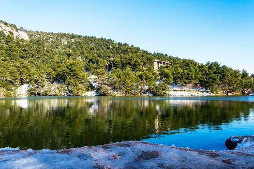 Photo of Lake Beletsi covered in snow, Ipokrateios politeia, Parnitha, Attica, Greece.