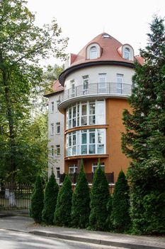 new modern house in the suburbs on sunny summer day