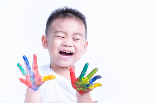 Happy asian child kid smile on education art show hand with water color or finger paint on hands the photogarphy in studio on with background, Baby 2-3 years