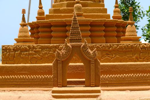 detail of gate of sand pagoda in Songkran festival represents In order to take the sand scraps attached to the feet from the temple to return the temple in the shape of a sand pagoda