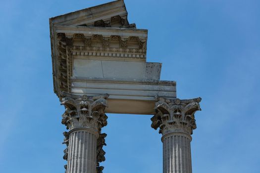 Greek columns of a temple in Greece, seen from below. Architecture, history, travel, landscapes