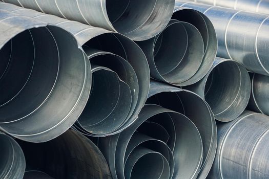Pipes for exhaust ventilation. Background. Dismantling and construction at the facility.