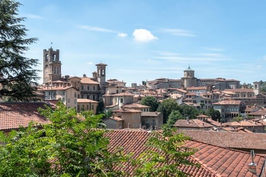 Upper town. Bergamo, Italy. Landscape at the city center, the old towers and the clock towers from the ancient fortress. Bergamo, ITALY - August 19, 2020.